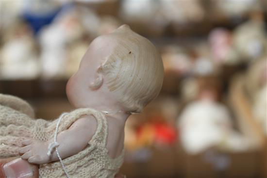 An SFBJ 23b doll,10in., firing fault to rim of head and a Heubach bisque baby, 5in.